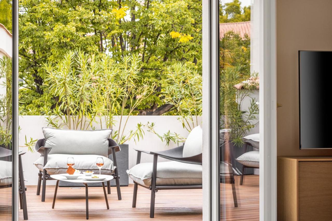 Maison Albar Hotels L'Imperator Nîmes Exteriör bild A sliding door